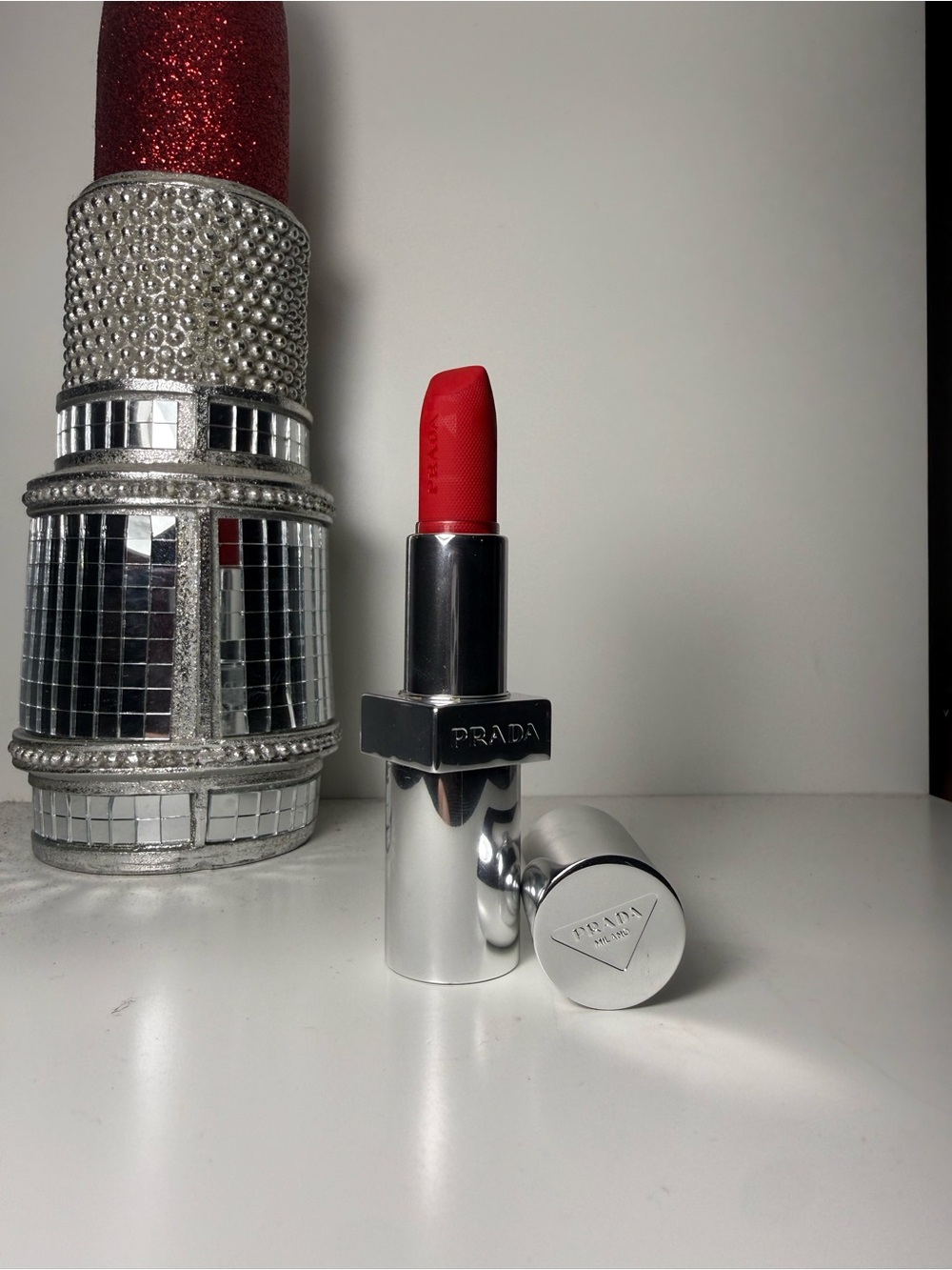 Prada Vibrant Red Satin Lipstick - Elegant Silver Case